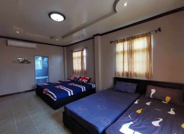 Imagen de la habitación del Hotel Lek Homestay. Foto 17