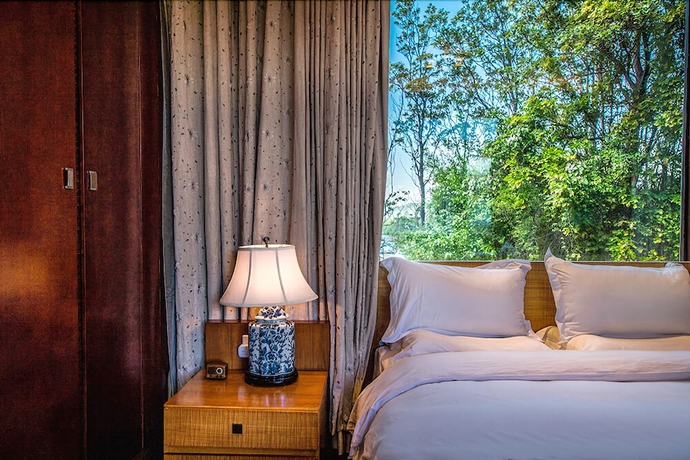 Imagen de la habitación del Hotel Leliving Butterfly Resort Lijiang. Foto 3