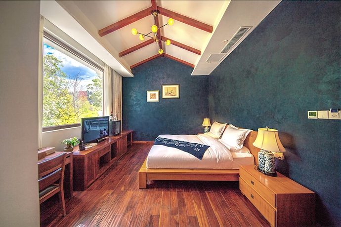 Imagen de la habitación del Hotel Leliving Butterfly Resort Lijiang. Foto 6