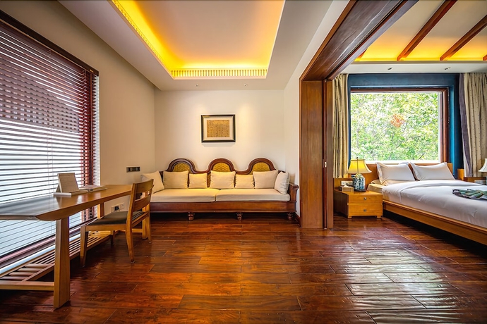Imagen de la habitación del Hotel Leliving Butterfly Resort Lijiang. Foto 8