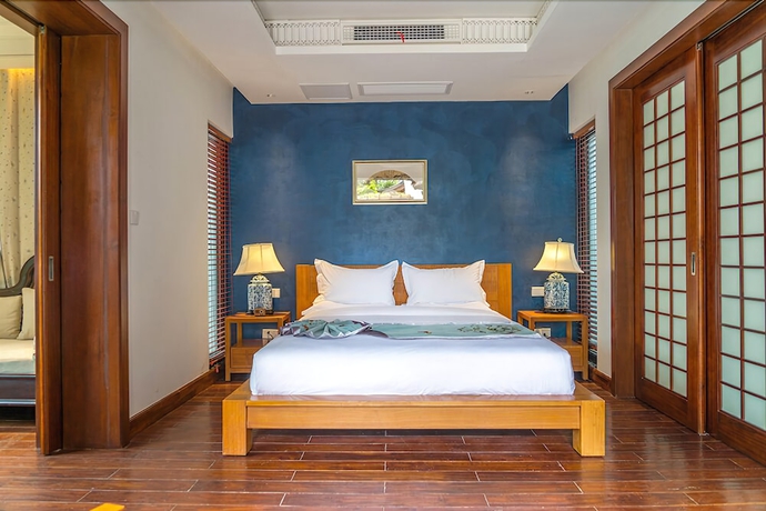 Imagen de la habitación del Hotel Leliving Butterfly Resort Lijiang. Foto 9
