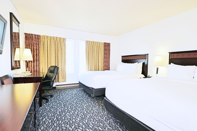 Imagen de la habitación del Hotel Lelux, Montreal. Foto 8