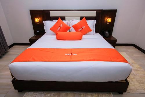 Imagen de la habitación del Hotel Lemaiyan Suites. Foto 12