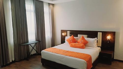 Imagen de la habitación del Hotel Lemaiyan Suites. Foto 13