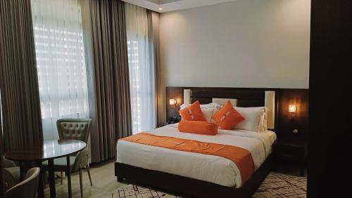 Imagen de la habitación del Hotel Lemaiyan Suites. Foto 17