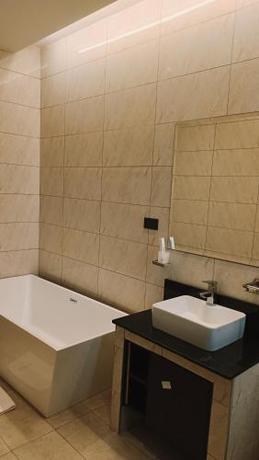 Imagen de la habitación del Hotel Lemaiyan Suites. Foto 20