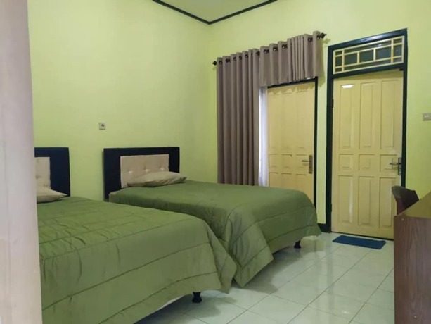 Imagen de la habitación del Hotel Lembah Rinjani Villa and Resto. Foto 17