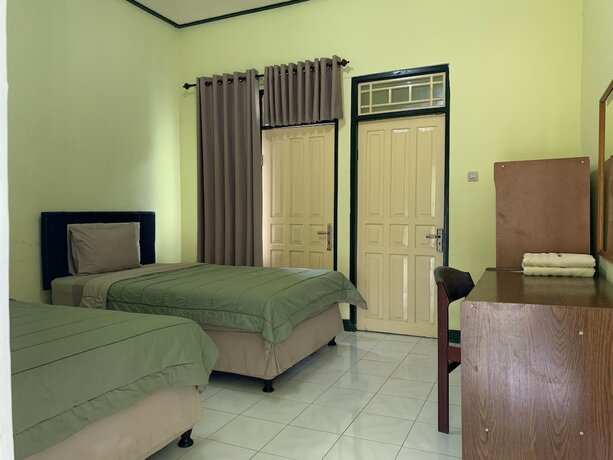 Imagen de la habitación del Hotel Lembah Rinjani Villa and Resto. Foto 18