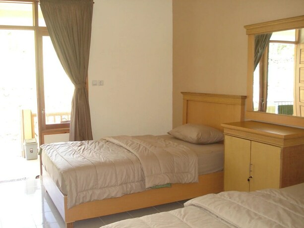 Imagen de la habitación del Hotel Lembah Rinjani Villa and Resto. Foto 20