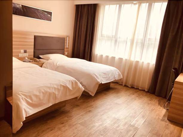 Imagen de la habitación del Hotel Lembay Guilin Exhibition Branch. Foto 9