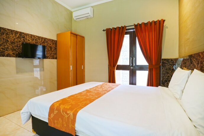 Imagen de la habitación del Hotel Lembayung Sari Homestay. Foto 17