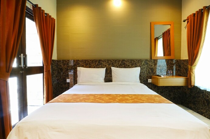Imagen de la habitación del Hotel Lembayung Sari Homestay. Foto 22