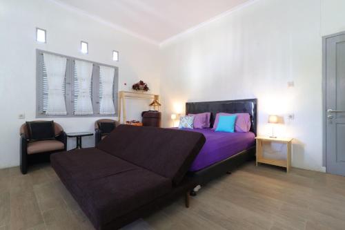 Imagen de la habitación del Hotel Lembur Incu Syariah Villa. Foto 5