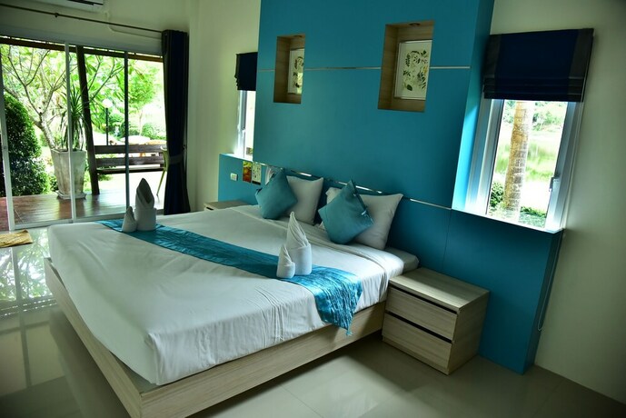 Imagen de la habitación del Hotel Lemon Chalet Kaeng Krachan Resort. Foto 19