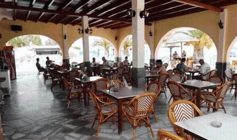Imagen del bar/restaurante del Hotel Lemon Grove and Studios. Foto 4