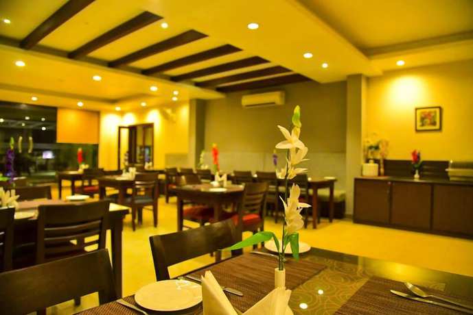 Imagen del bar/restaurante del Hotel Lemon Park By Rosefinch. Foto 4