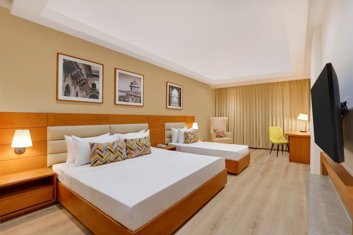 Imagen de la habitación del Hotel Lemon Tree Agra. Foto 3