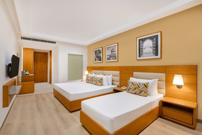 Imagen de la habitación del Hotel Lemon Tree Agra. Foto 6