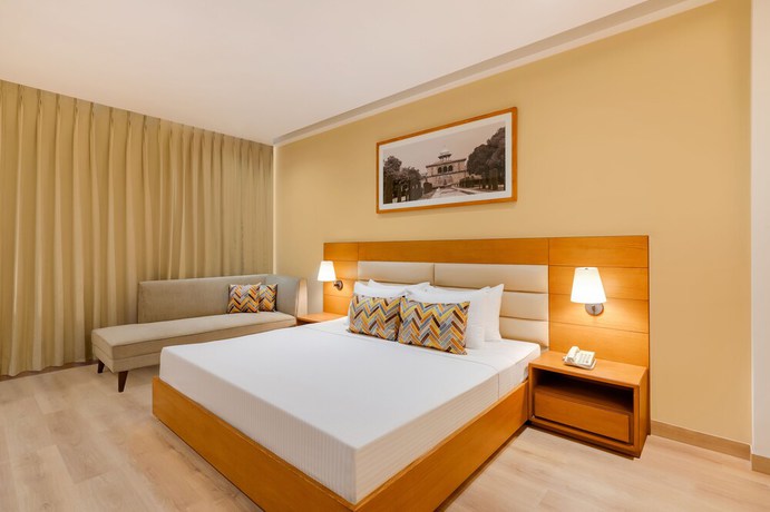 Imagen de la habitación del Hotel Lemon Tree Agra. Foto 12