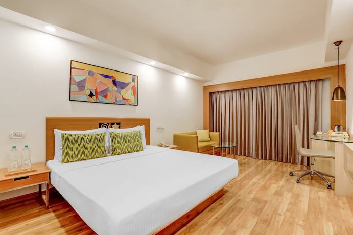 Imagen de la habitación del Hotel Lemon Tree, Ahmedabad. Foto 4