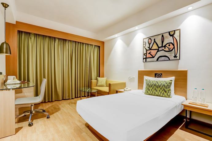 Imagen de la habitación del Hotel Lemon Tree, Ahmedabad. Foto 5