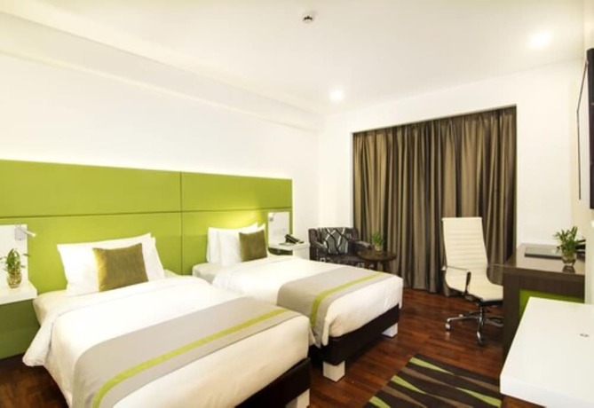Imagen de la habitación del Hotel Lemon Tree Banjara Hills. Foto 11