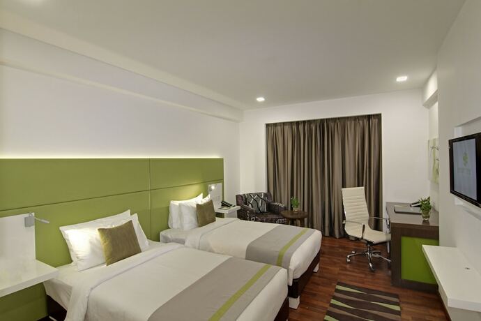 Imagen de la habitación del Hotel Lemon Tree Banjara Hills. Foto 12