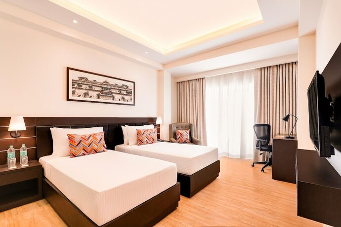 Imagen de la habitación del Hotel Lemon Tree Bhopal. Foto 16