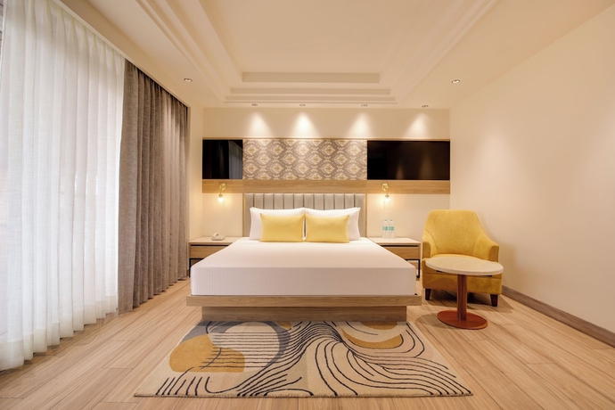 Imagen de la habitación del Hotel Lemon Tree Bhubaneswar. Foto 6