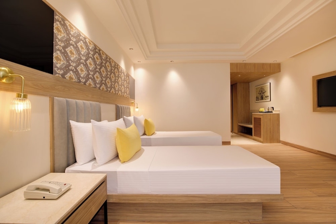 Imagen de la habitación del Hotel Lemon Tree Bhubaneswar. Foto 10