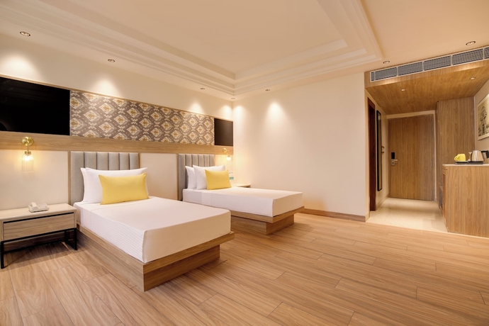 Imagen de la habitación del Hotel Lemon Tree Bhubaneswar. Foto 11