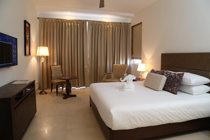 Imagen de la habitación del Hotel Lemon Tree Candolim Goa. Foto 12