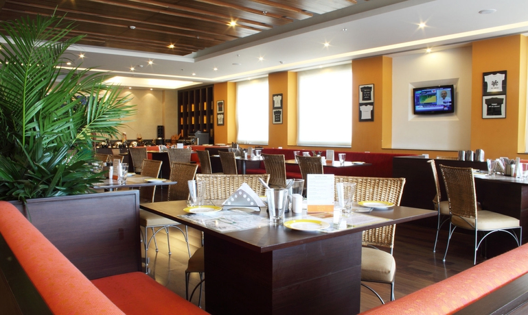 Imagen del bar/restaurante del Hotel Lemon Tree , Electronics City - Bengaluru. Foto 1