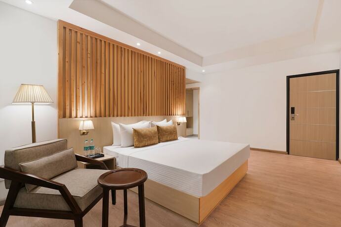 Imagen de la habitación del Hotel Lemon Tree Haridwar. Foto 11