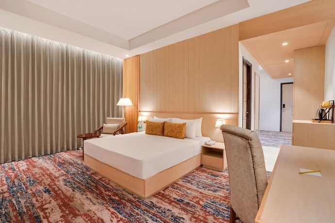 Imagen de la habitación del Hotel Lemon Tree Haridwar. Foto 12