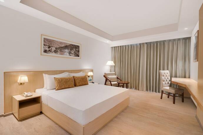 Imagen de la habitación del Hotel Lemon Tree Haridwar. Foto 16