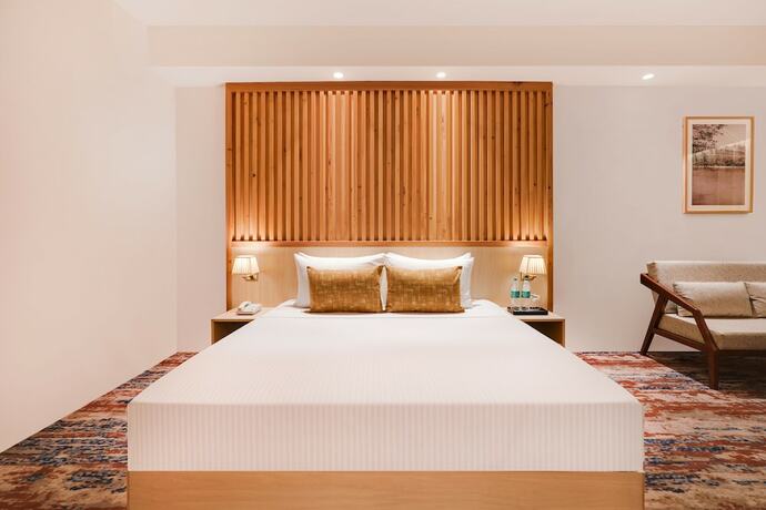 Imagen de la habitación del Hotel Lemon Tree Haridwar. Foto 17