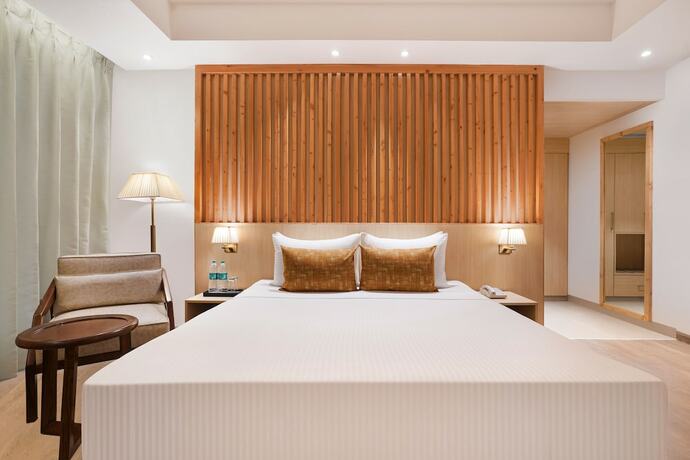 Imagen de la habitación del Hotel Lemon Tree Haridwar. Foto 18
