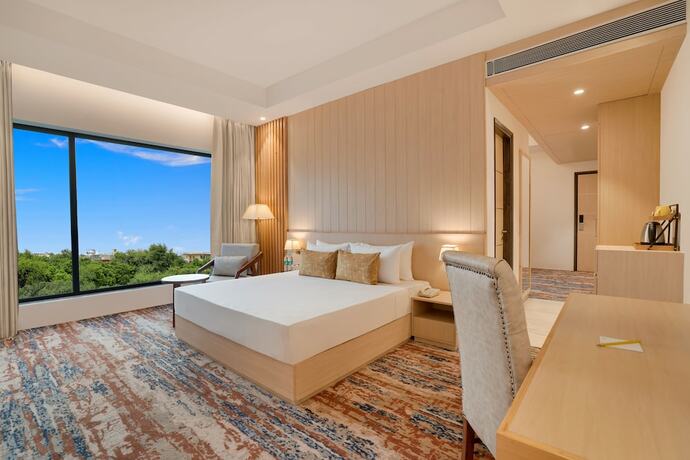 Imagen de la habitación del Hotel Lemon Tree Haridwar. Foto 19