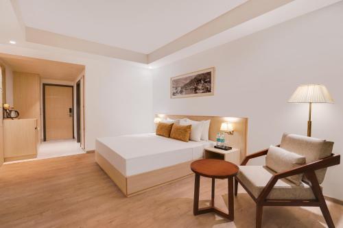 Imagen de la habitación del Hotel Lemon Tree, Haridwar. Foto 17