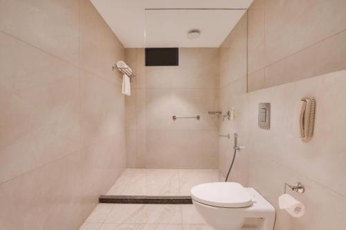 Imagen de la habitación del Hotel Lemon Tree, Haridwar. Foto 20