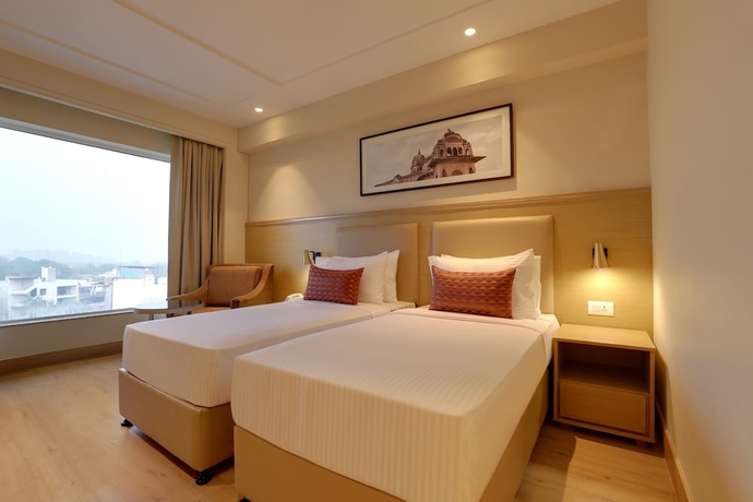 Imagen de la habitación del Hotel Lemon Tree Jhansi. Foto 2