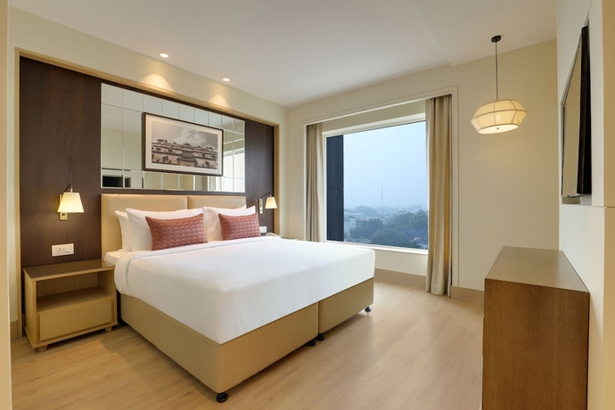 Imagen de la habitación del Hotel Lemon Tree Jhansi. Foto 5