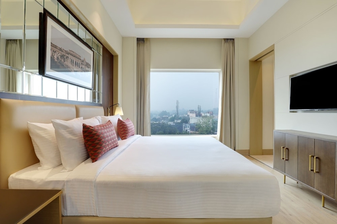 Imagen de la habitación del Hotel Lemon Tree Jhansi. Foto 7