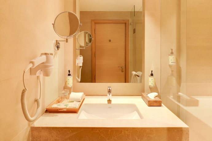 Imagen de la habitación del Hotel Lemon Tree Jhansi. Foto 15
