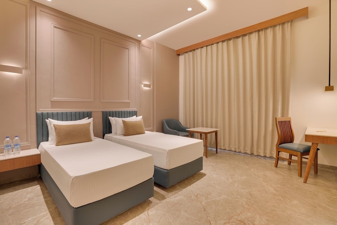 Imagen de la habitación del Hotel Lemon Tree Morbi. Foto 10