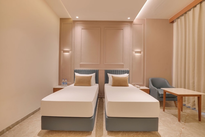 Imagen de la habitación del Hotel Lemon Tree Morbi. Foto 11