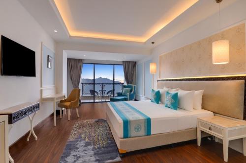 Imagen de la habitación del Hotel Lemon Tree Premier Budhanilkantha Kathmandu, Nepal. Foto 20