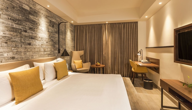 Imagen de la habitación del Hotel Lemon Tree Premier City Center Pune. Foto 4