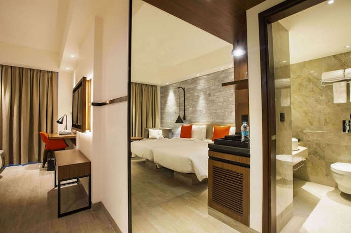 Imagen de la habitación del Hotel Lemon Tree Premier City Center Pune. Foto 6